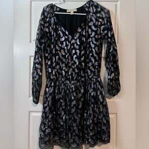 Gently used black mini dress.